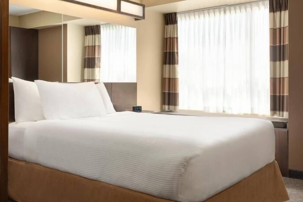 Desk, blackout drapes, iron/ironing board, free WiFi