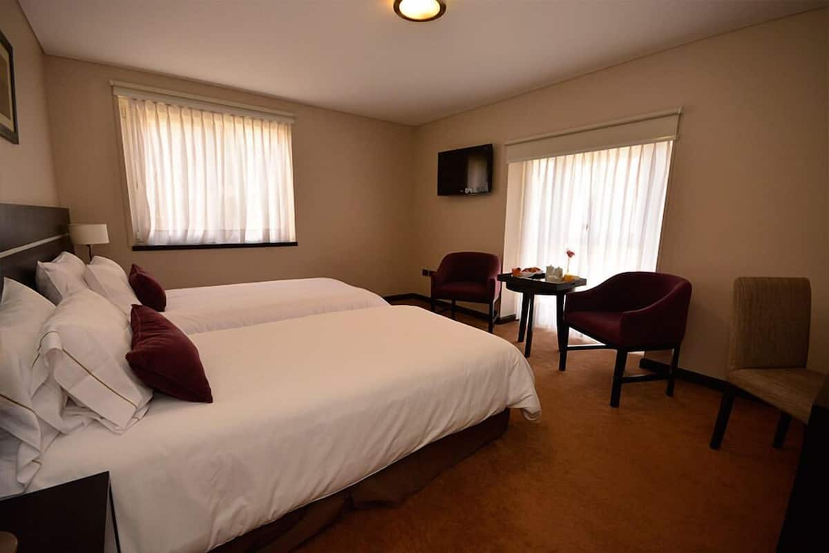 Ropa de cama de alta calidad y minibar