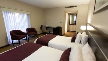 Ropa de cama de alta calidad y minibar