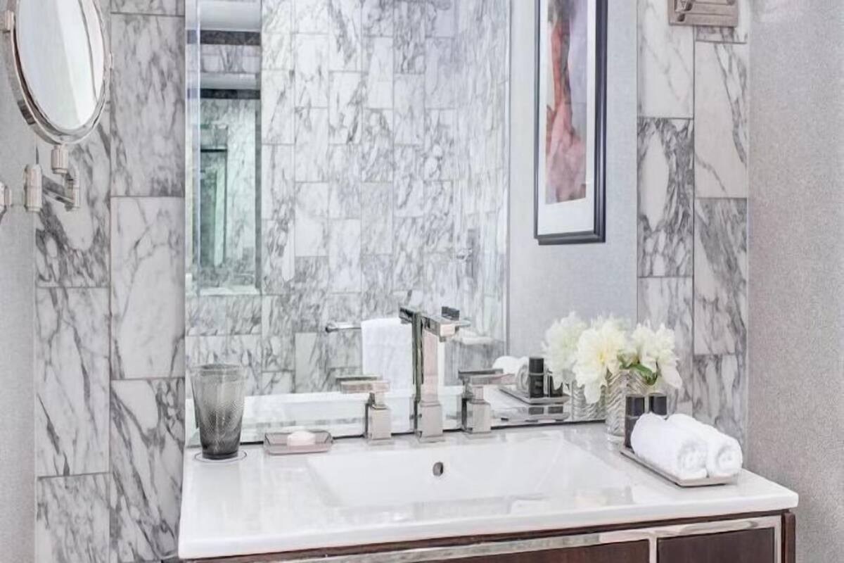 Shower, rainfall showerhead, designer toiletries, hair dryer