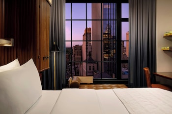 Deluxe Room, 1 King Bed, Non Smoking, City View | 1 bedroom, hypo-allergenic bedding, down comforters, pillowtop beds at Le Meridien New York, Central Park by Marriott