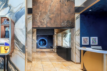 Hotel entrance and lobby at Le Meridien New York, Central Park by Marriott