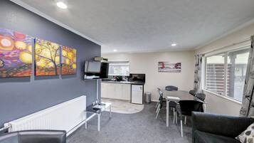 Apartment, 2 Bedrooms | Living area | 32-inch LCD TV with satellite channels, TV