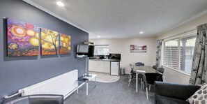 Apartment, 2 Bedrooms | Living area | 32-inch LCD TV with satellite channels, TV - Capri on Fenton (Rotorua)