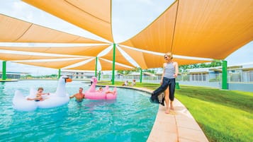 2 outdoor pools, open 7 AM to 9 PM, pool loungers