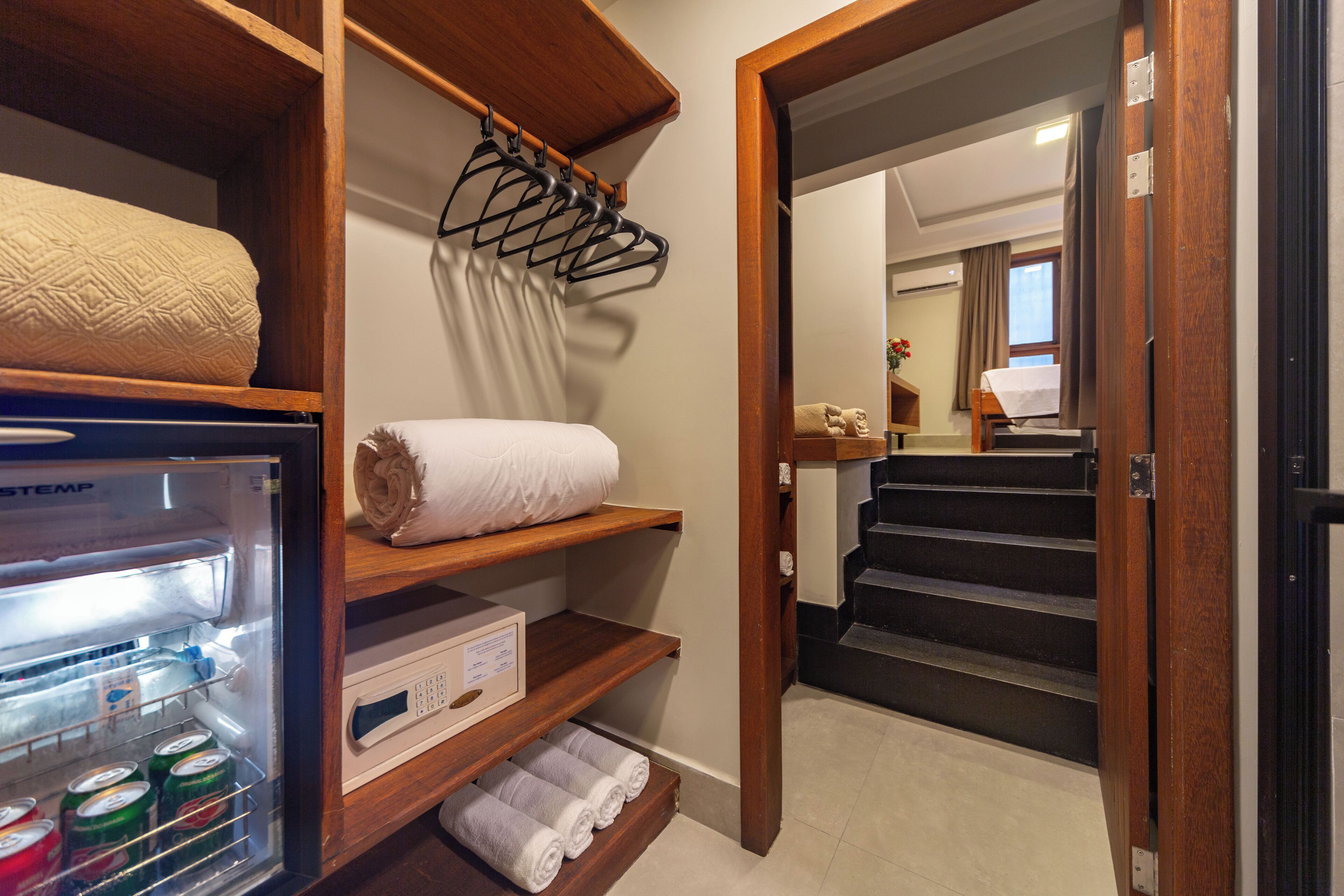 family room | 1 bedroom, minibar, in-room safe, blackout curtains