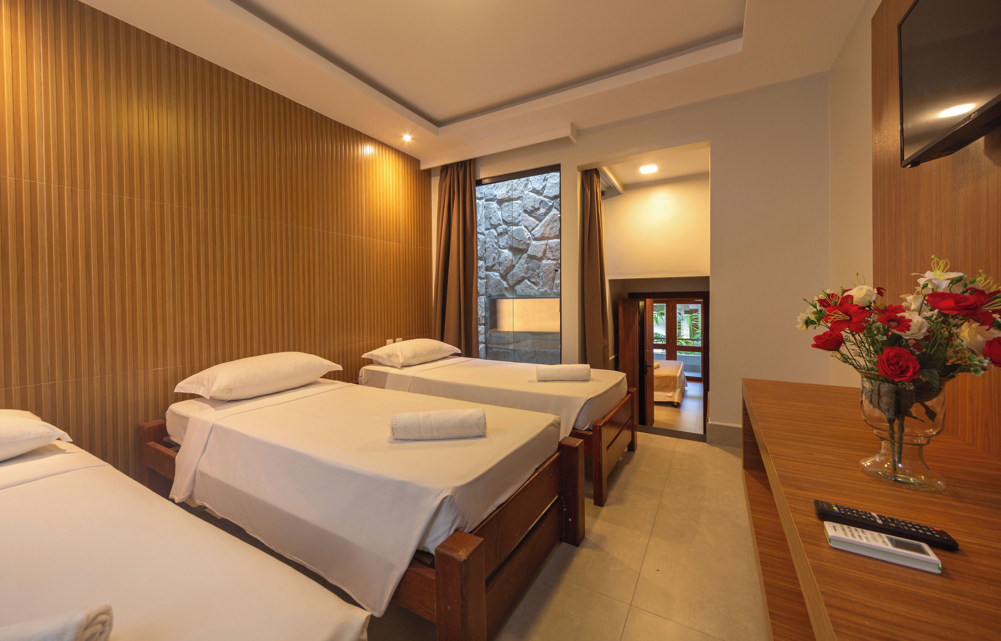 family room | 1 bedroom, minibar, in-room safe, blackout curtains