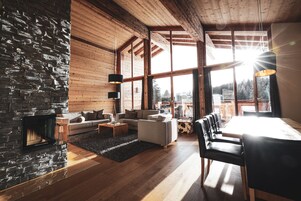 Chalet, 4 Bedrooms | Living area | Flat-screen TV, fireplace, first-run movies