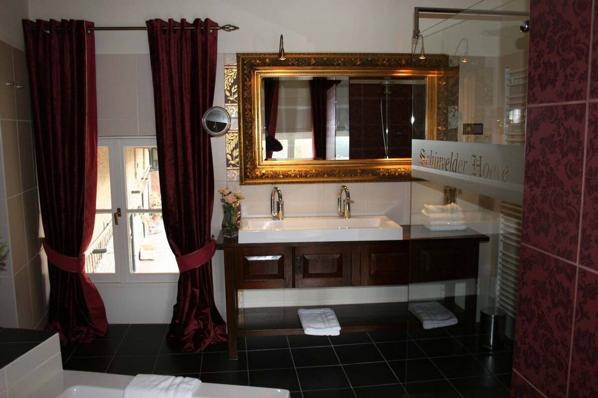 deep-soaking bathtub, free toiletries, hair dryer, bathrobes