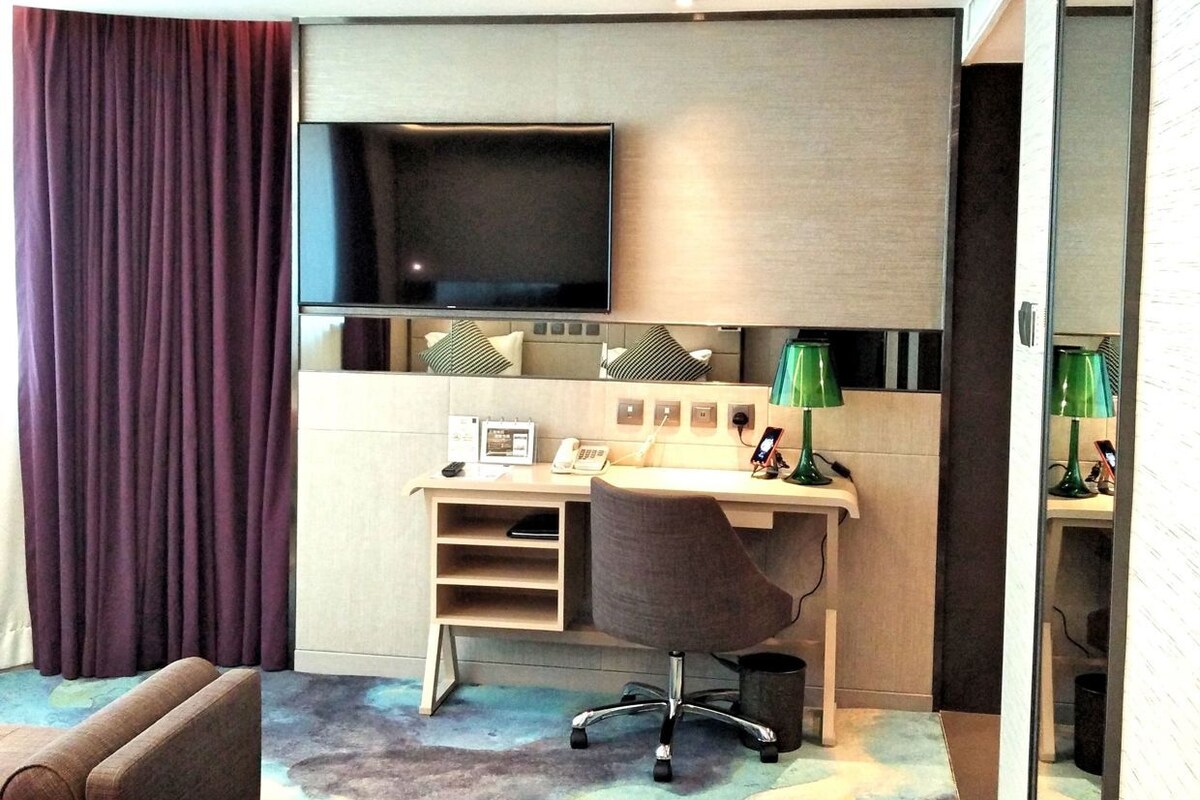 Down comforters, minibar, in-room safe, blackout drapes