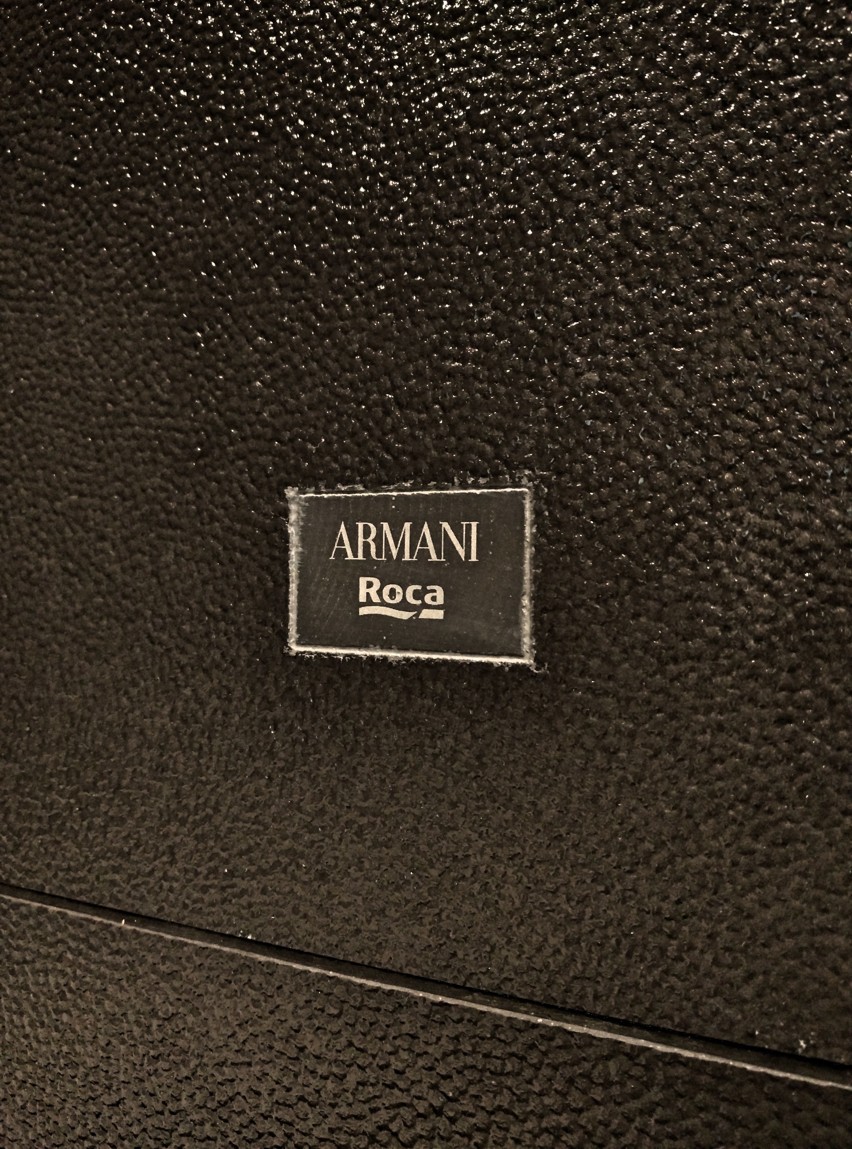 designer toiletries, hair dryer, slippers, towels