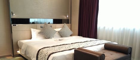 1 habitación, edredón, minibar y caja de seguridad en la habitación