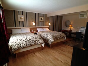 Deluxe Room, 2 Queen Beds | Desk, free WiFi - Galaxy Motel (St. Paul)