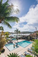 Outdoor pool, pool umbrellas, sun loungers