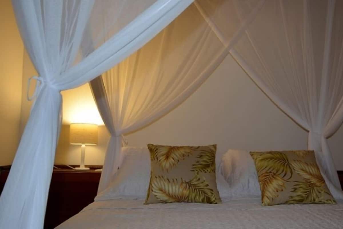 Habitación Deluxe | Minibar, wifi gratis y ropa de cama