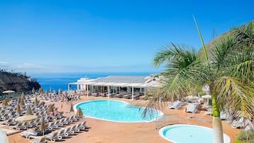 Outdoor pool, open 11:00 AM to 6:00 PM, pool umbrellas, pool loungers