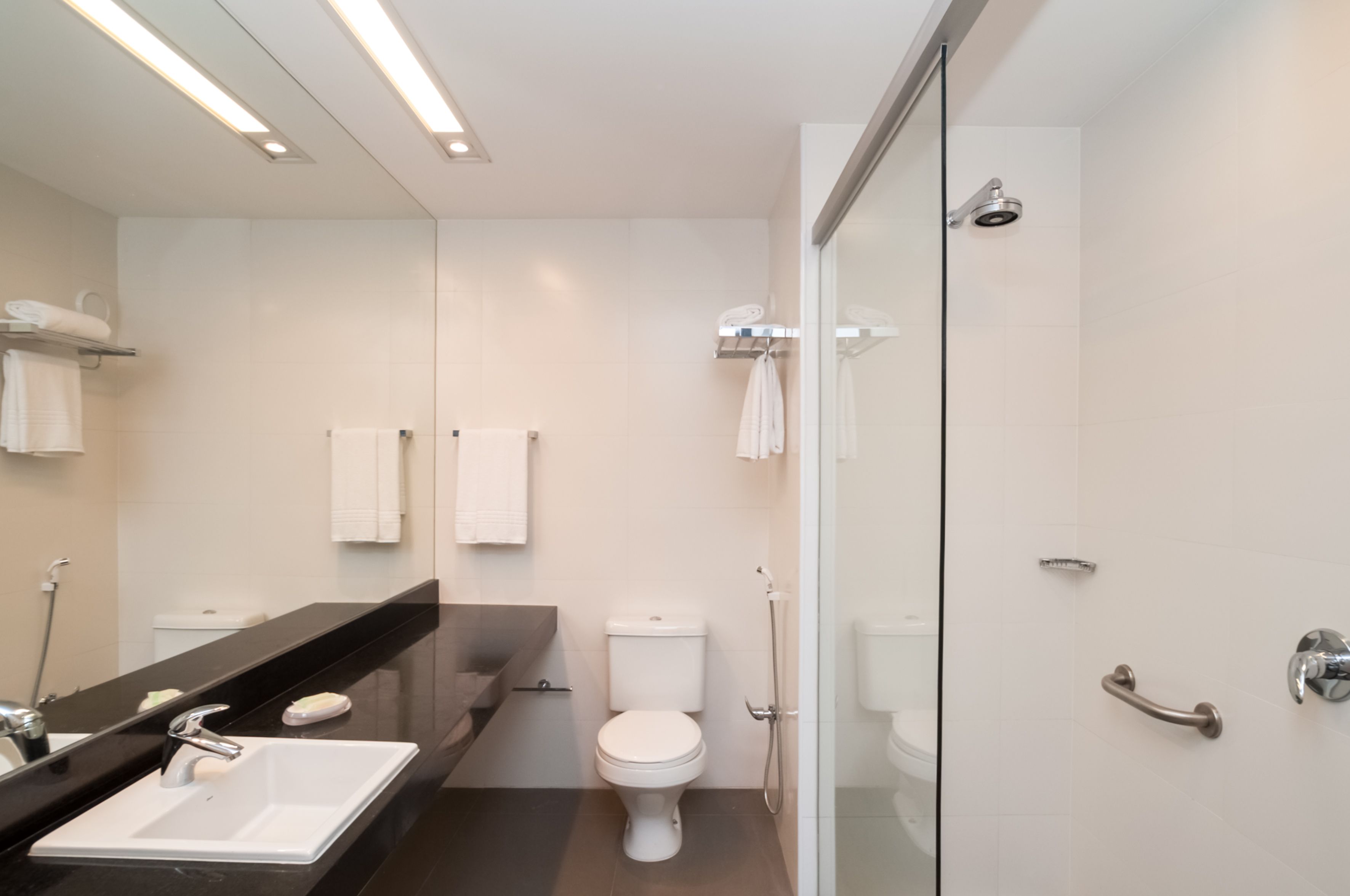 superior room | bathroom | shower, hair dryer, towels