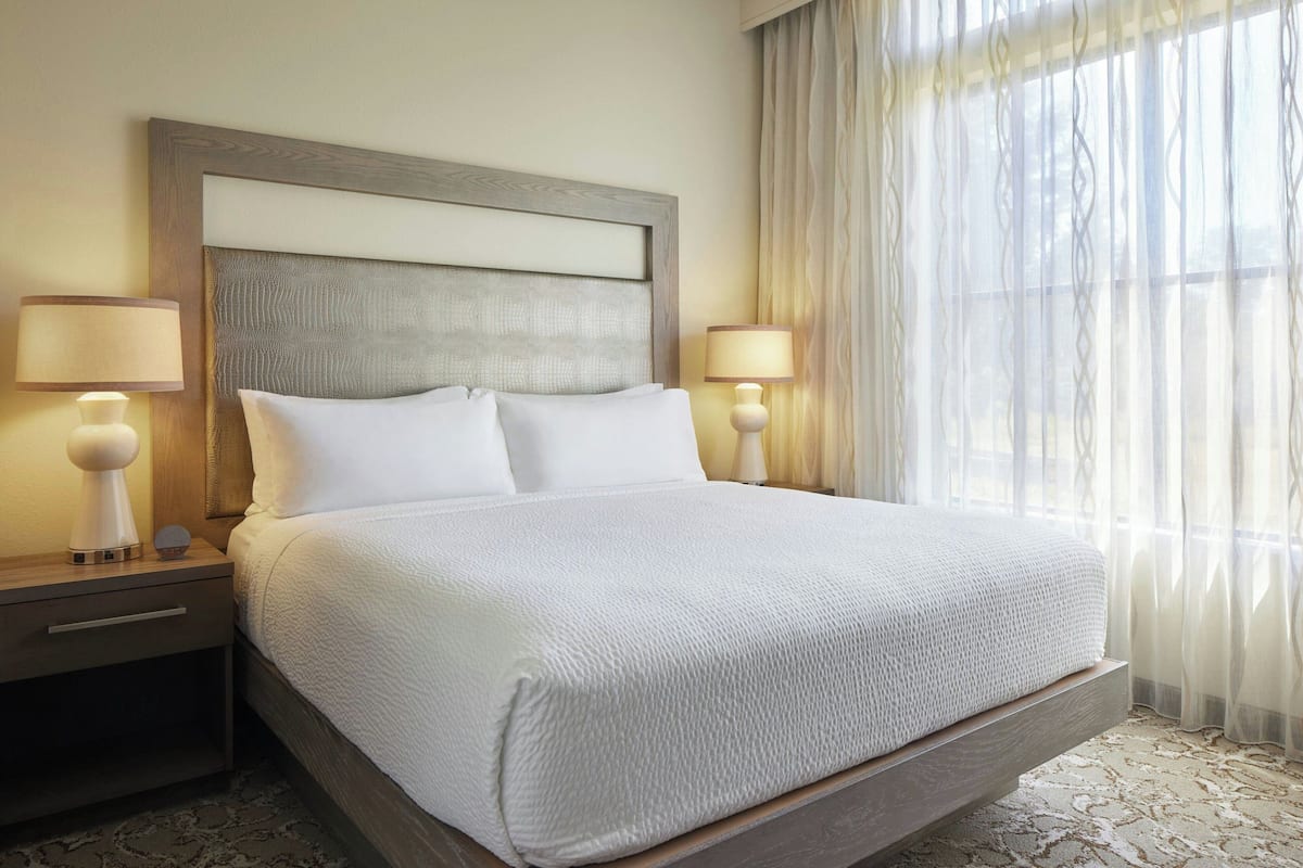 Premium bedding, in-room safe, blackout curtains, iron/ironing board