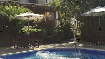 Outdoor pool, pool umbrellas, pool loungers