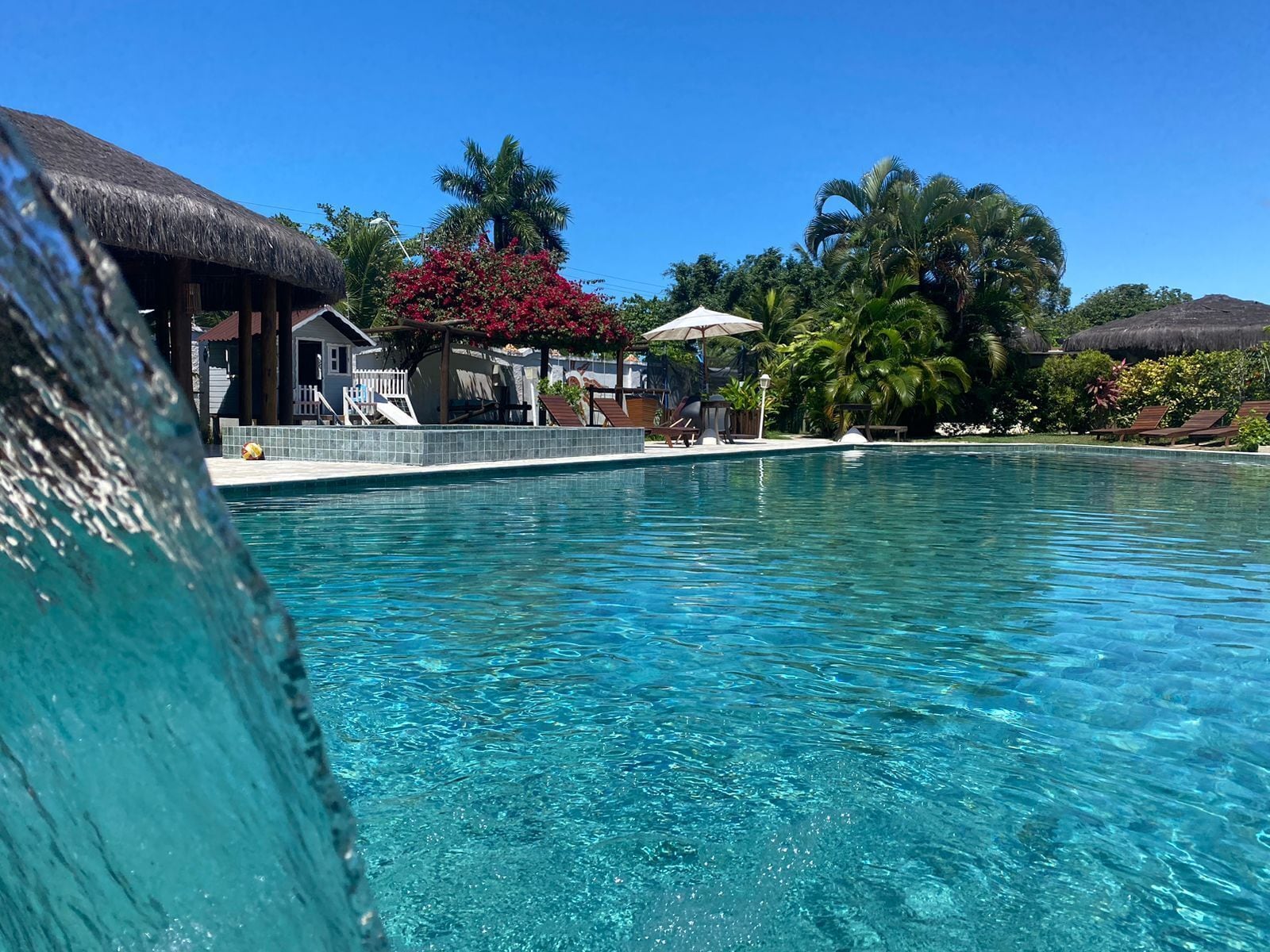 Outdoor pool, pool umbrellas, pool loungers