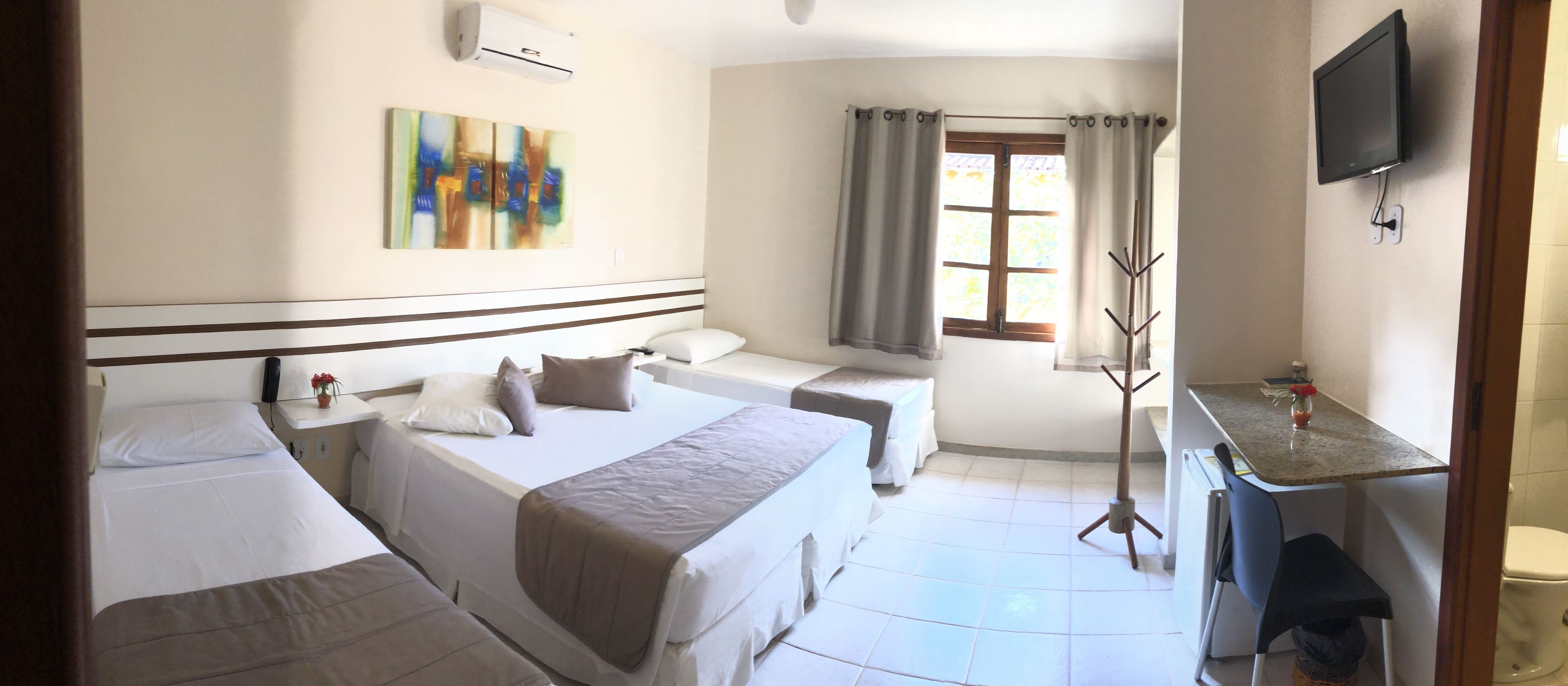 economy quadruple room | minibar, in-room safe, blackout curtains, free wifi