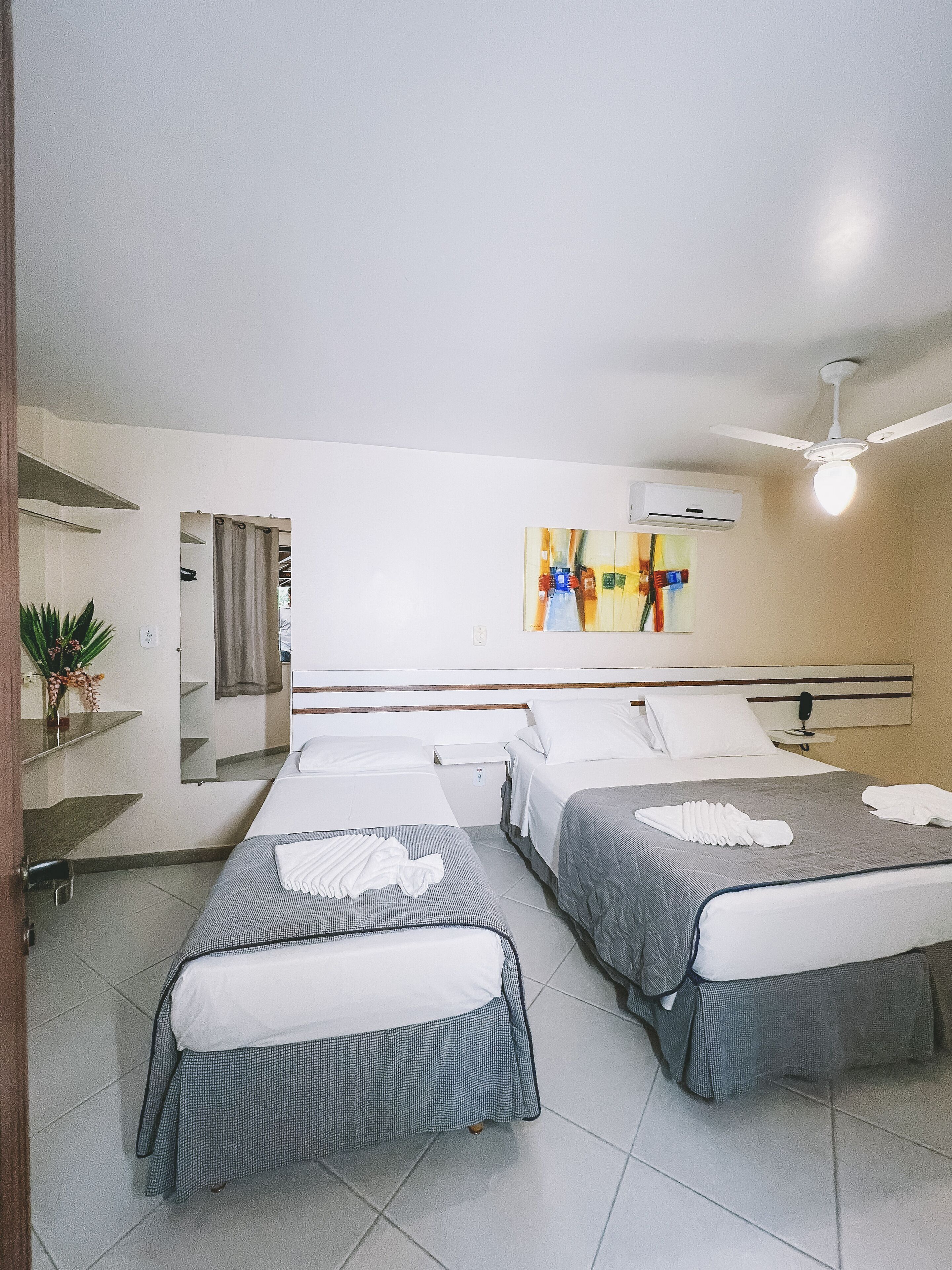 deluxe triple room | minibar, in-room safe, blackout curtains, free wifi
