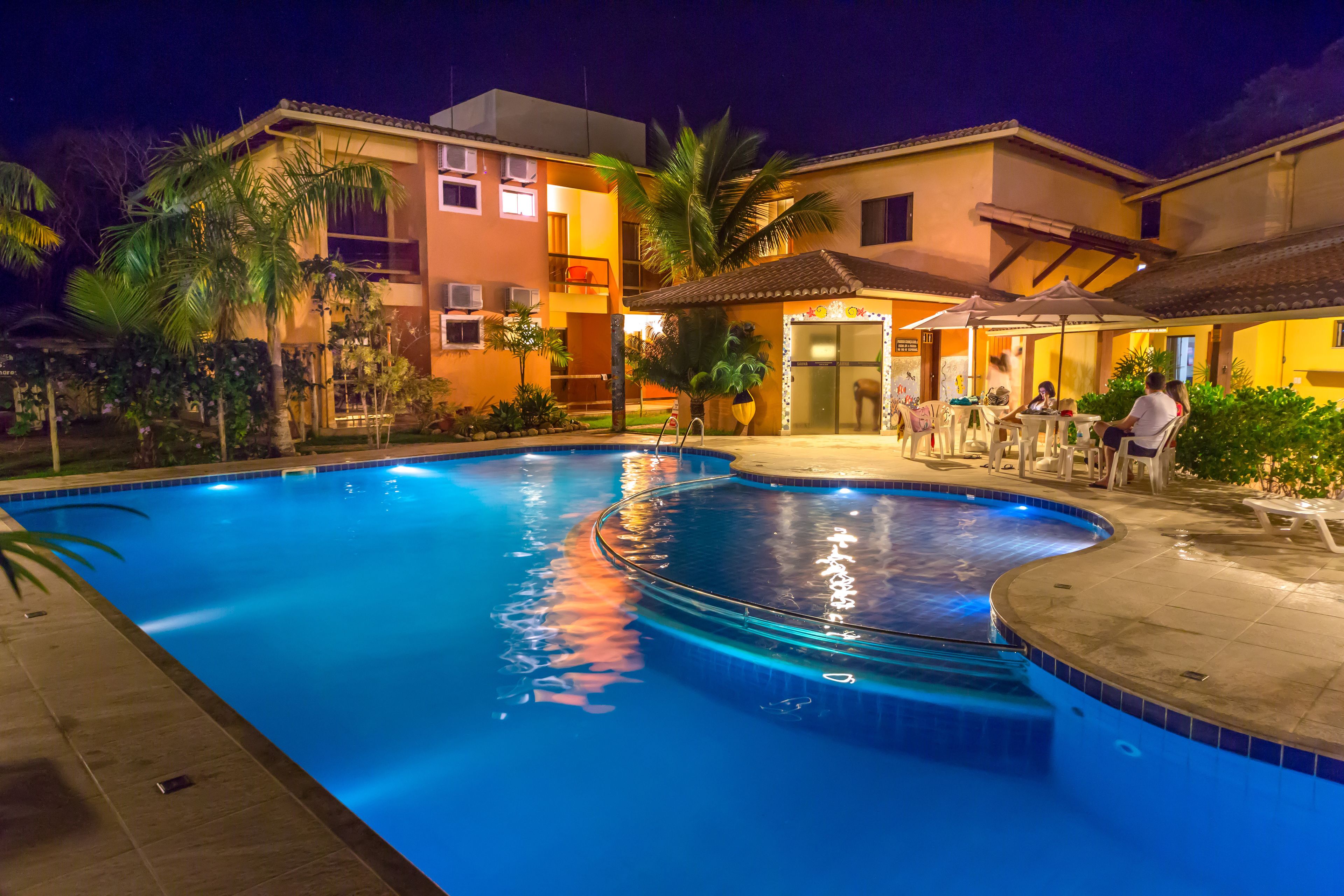 outdoor pool, open 9 am to 8 pm, pool umbrellas, pool loungers