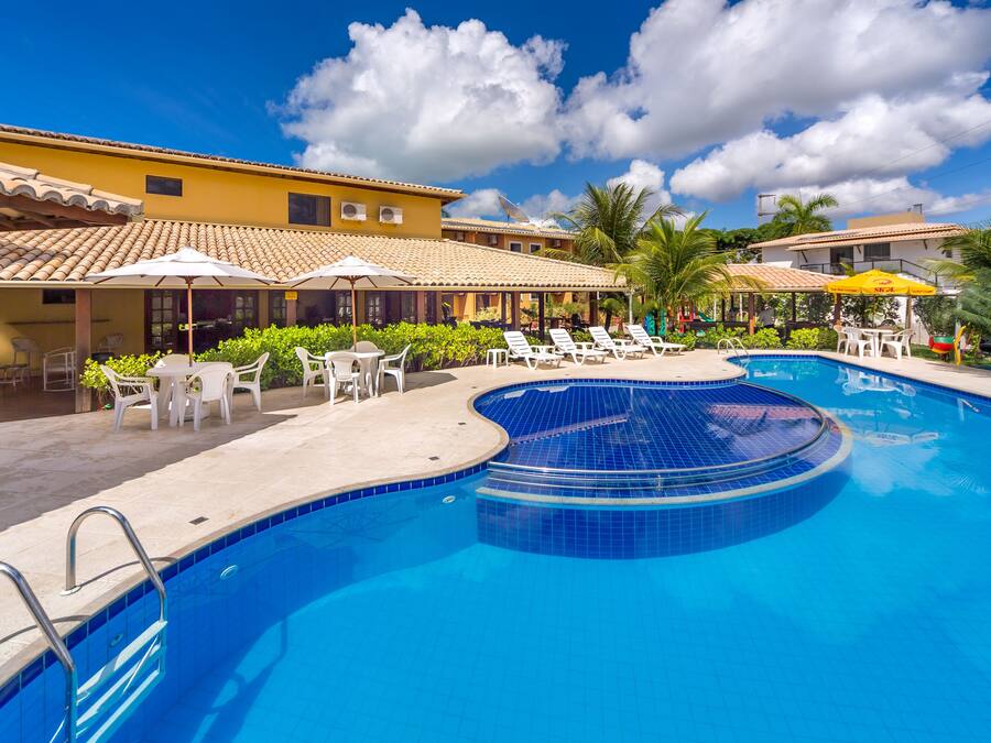 Outdoor pool, open 9 AM to 8 PM, pool umbrellas, pool loungers