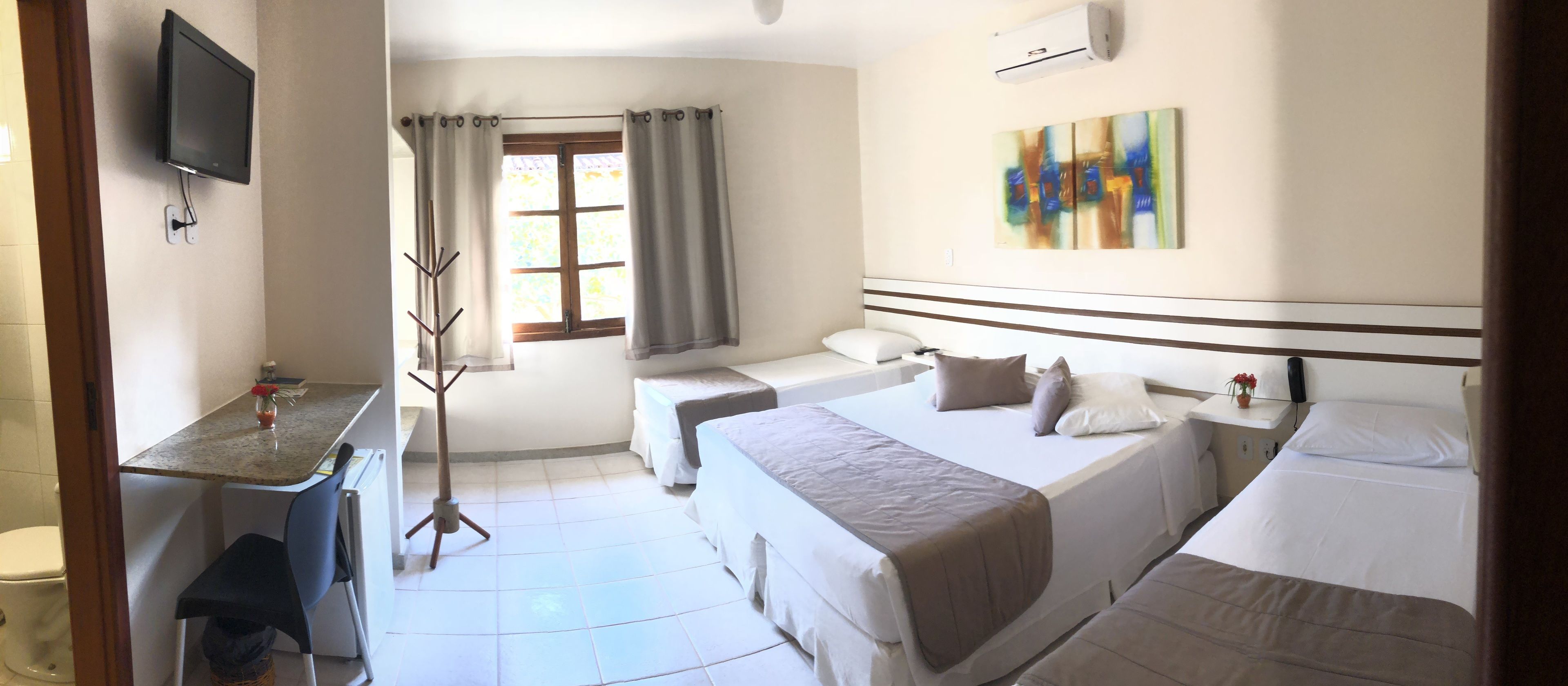 economy quadruple room | minibar, in-room safe, blackout curtains, free wifi