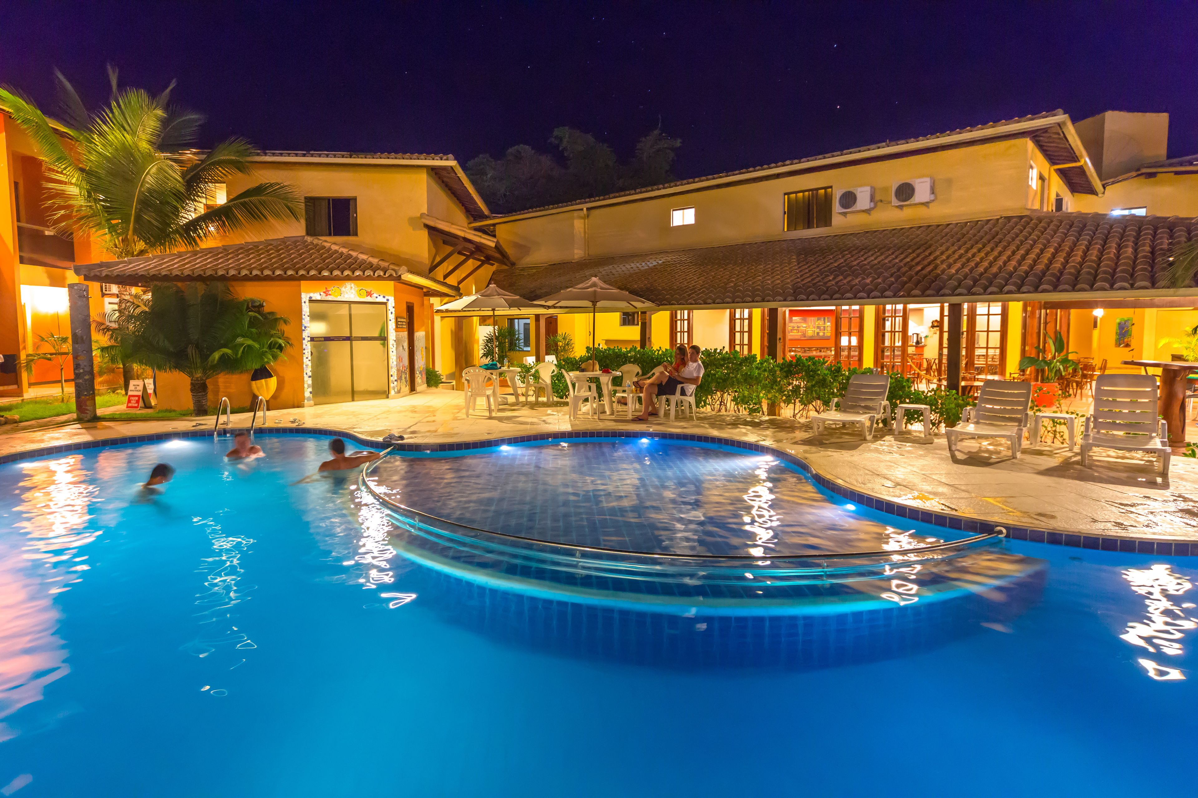 outdoor pool, open 9 am to 8 pm, pool umbrellas, pool loungers