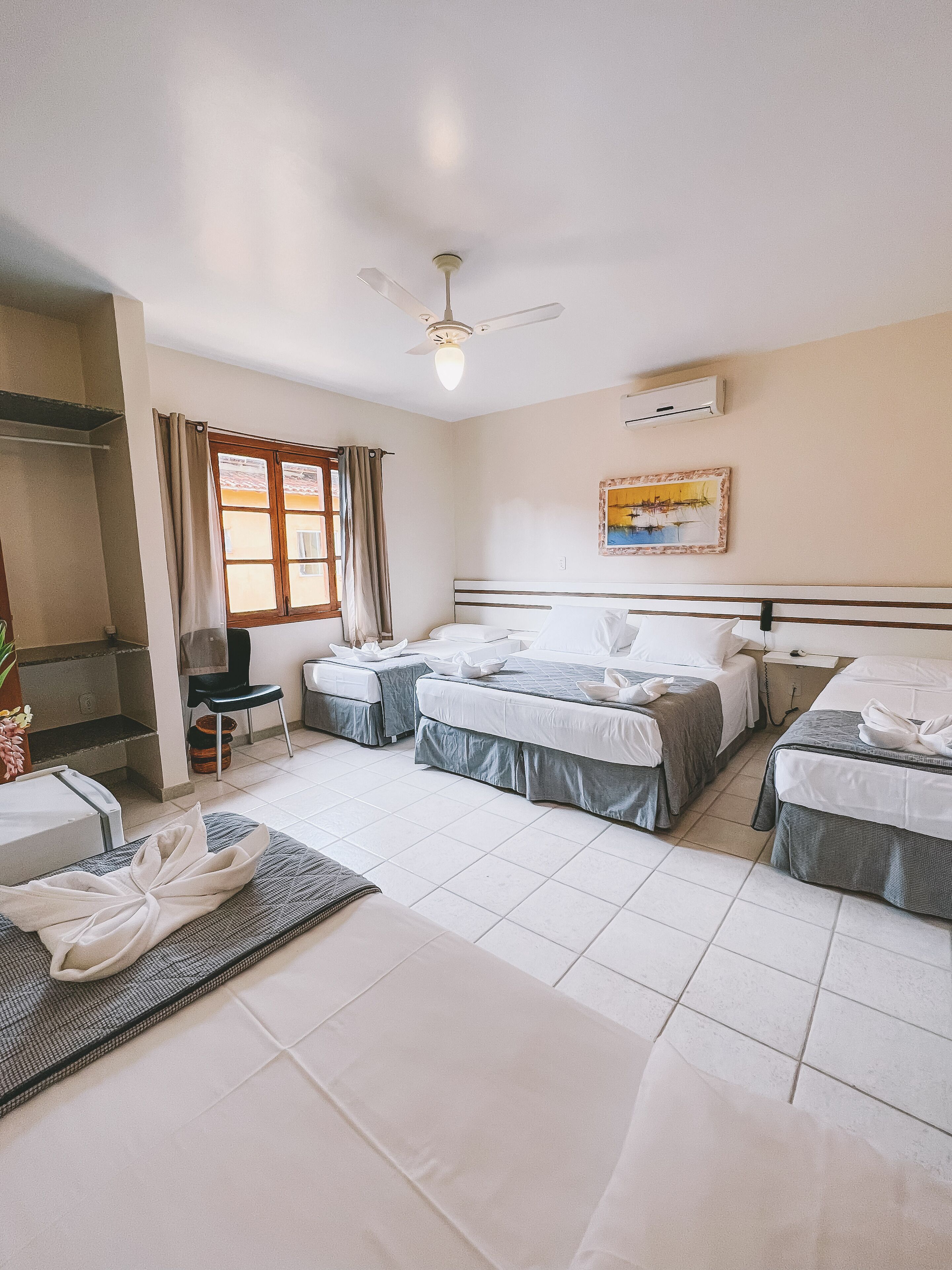 family room (economico) | minibar, in-room safe, blackout curtains, free wifi