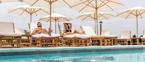Seasonal outdoor pool, pool umbrellas, sun loungers