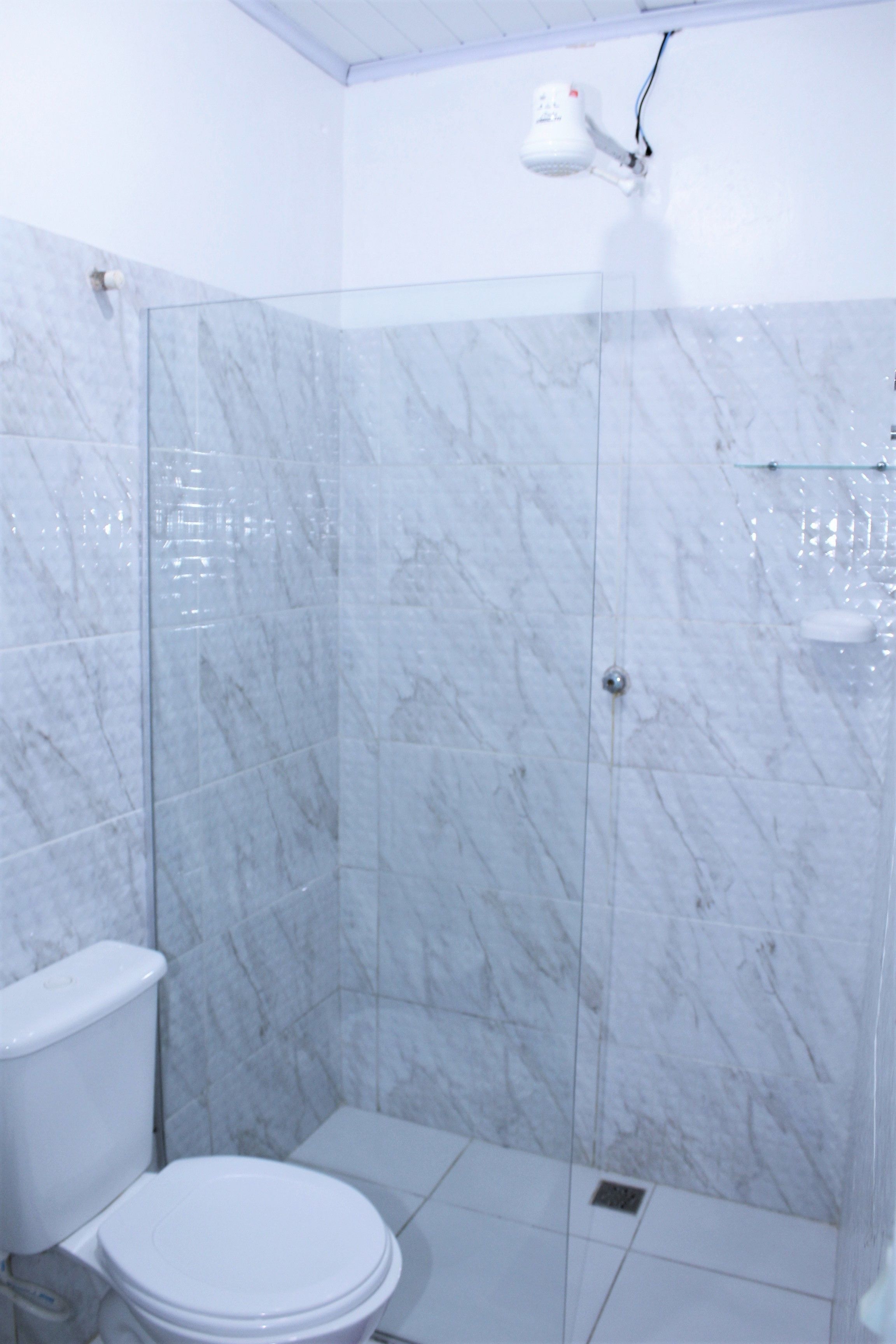 standard quadruple room | bathroom | shower, hair dryer, towels