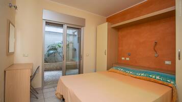 Standard Apartment, 1 Bedroom, Non Smoking, Courtyard View (semi-basement level) | Cribs/infant beds, rollaway beds