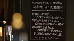 A menu board listing cocktails and bubbles with various drink names. - The Avenue (Durham)