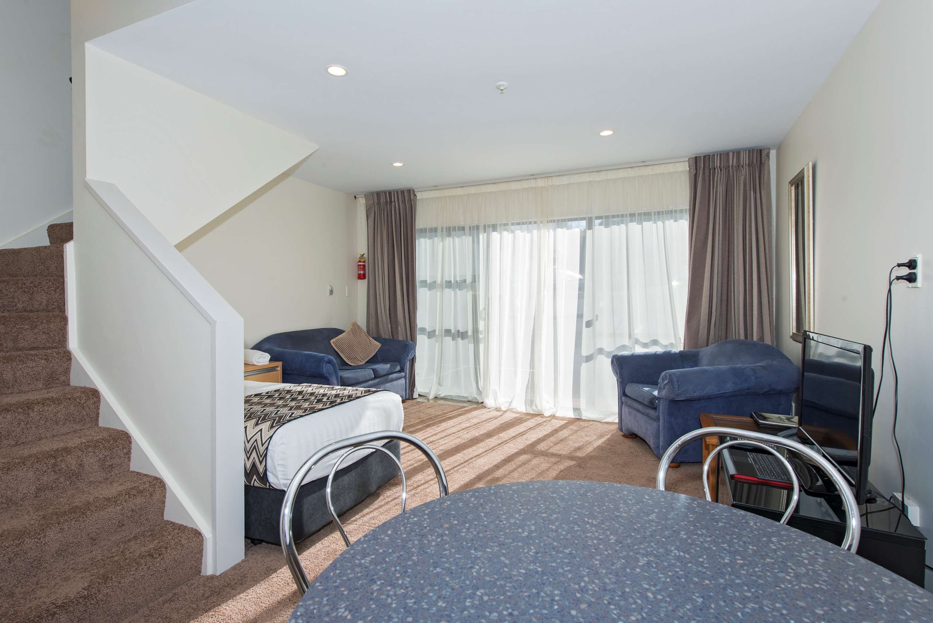 family suite | 1 bedroom, in-room safe, desk, laptop workspace