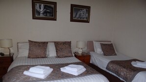 Quarto triplo família, suíte