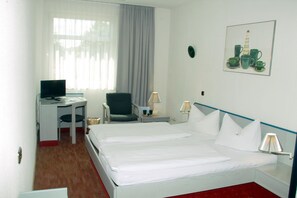 Hypo-allergenic bedding, blackout curtains, rollaway beds, free WiFi