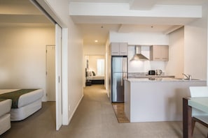 Apartment, 2 Bedrooms | Private kitchen | Full-size fridge, microwave, stovetop, dishwasher