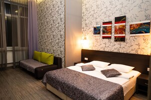 디럭스룸 | 이탈리아 프레떼 시트, 고급 침구, 필로우탑 침대, 객실 내 금고