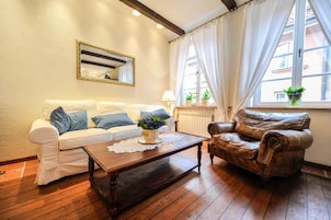 Apartment | Living room | 42-inch flat-screen TV with cable channels, LCD TV, DVD player