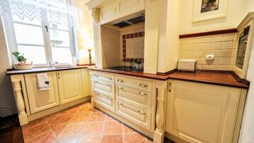 Apartment | Private kitchenette | Fridge, microwave, stovetop, dishwasher