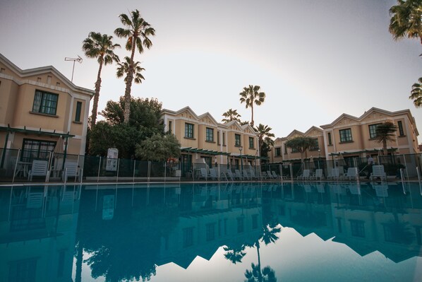 Outdoor pool, pool umbrellas, pool loungers