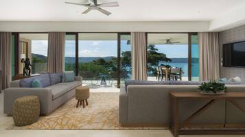 Penthouse, 3 Bedrooms | Living area | 42-inch Smart TV with cable channels, TV, iPod dock