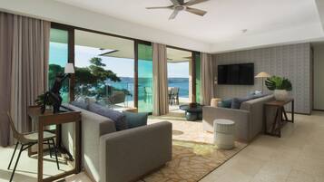 Penthouse, 3 Bedrooms | Living area | 42-inch Smart TV with cable channels, TV, iPod dock
