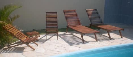 Outdoor pool, open 8 AM to 8 PM, pool umbrellas, sun loungers