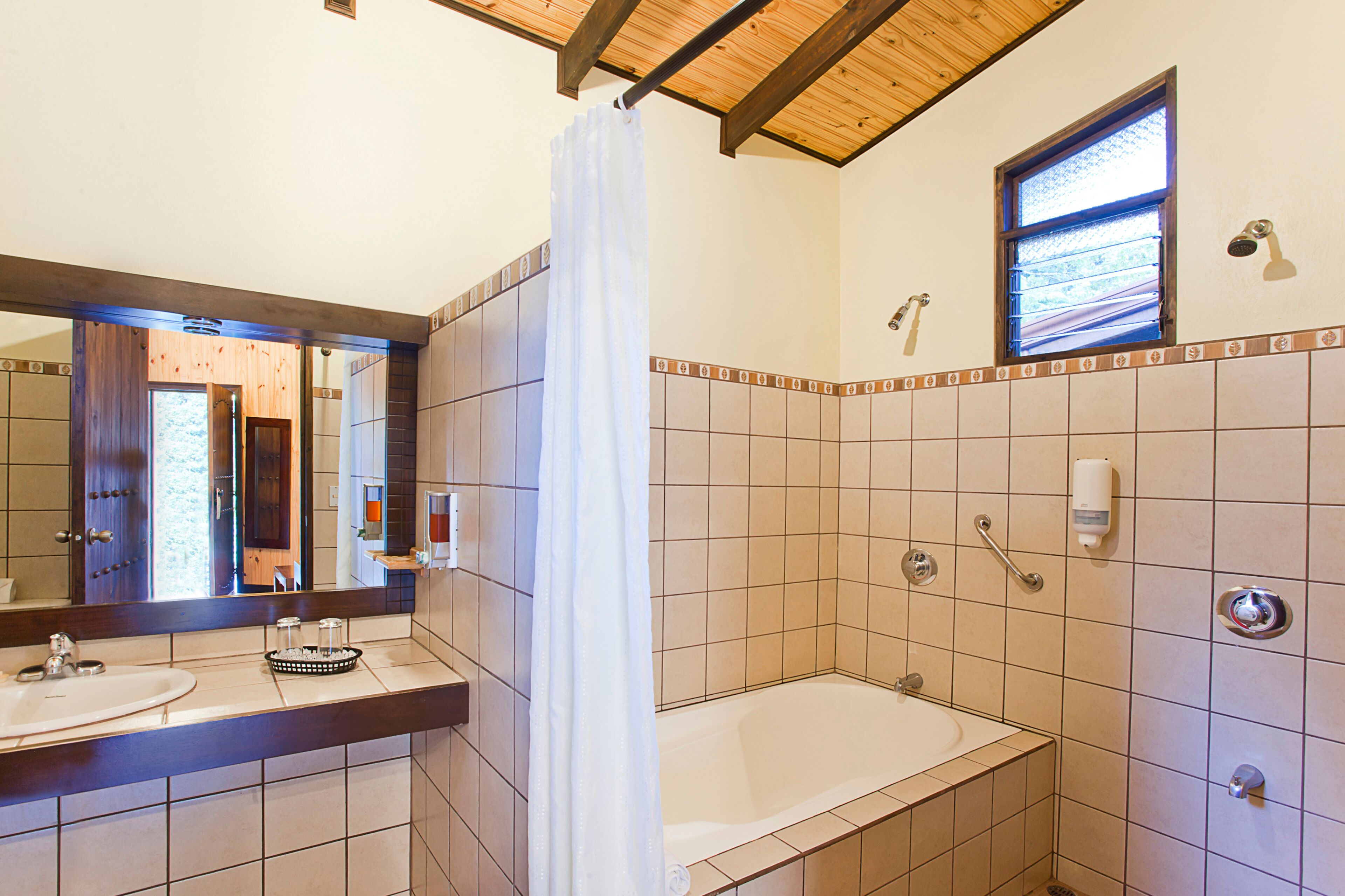 junior double room | bathroom | jetted bath, eco-friendly toiletries, hair dryer, towels