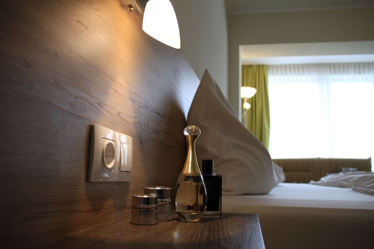 deluxe double room, balcony, mountain view | hypo-allergenic bedding, in-room safe, desk, free wifi