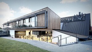 A modern building with a flat roof, large windows, and a visible outdoor seating area. - Regatta Hotel Restauracja Spa (Poznan)