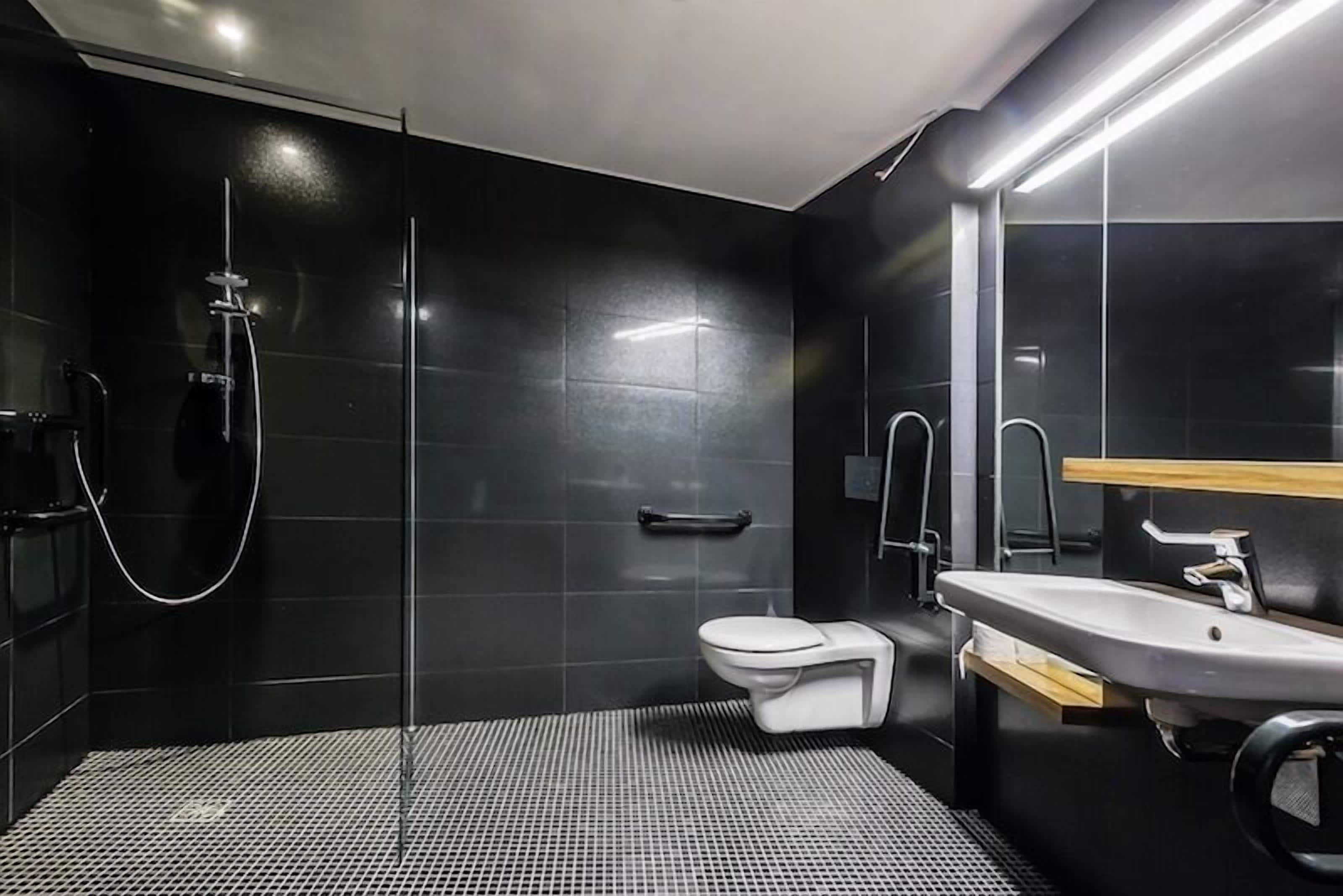 deluxe connected room | bathroom | free toiletries, hair dryer, bathrobes, towels
